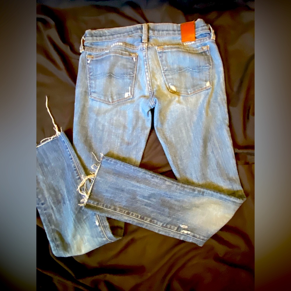 Lucky brand straight skinny jeans with cut off at the bottom size 24